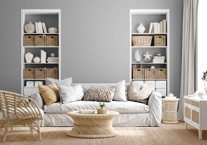 Cozy grey living room interior with coastal furniture